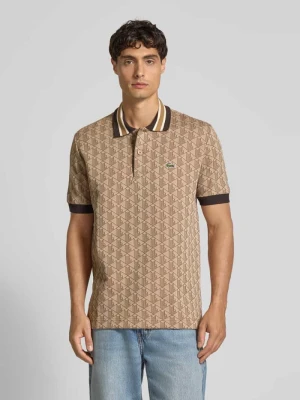Koszulka polo o kroju regular fit ze wzorem na całej powierzchni Lacoste