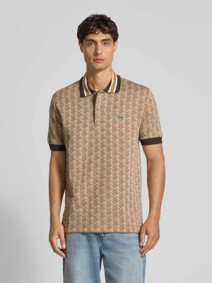 Koszulka polo o kroju regular fit ze wzorem na całej powierzchni Lacoste