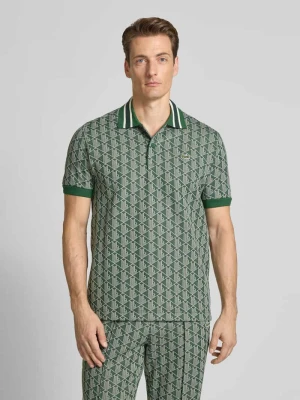 Koszulka polo o kroju regular fit ze wzorem na całej powierzchni Lacoste