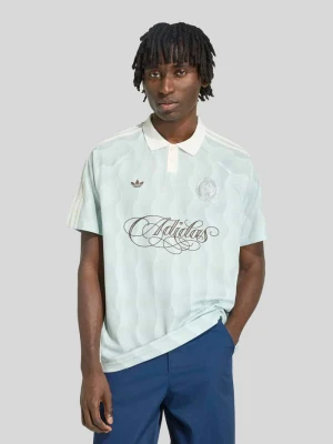 Koszulka polo o kroju relaxed fit z aplikacją z logo adidas Originals Trzcinowy