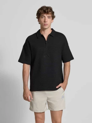 Koszulka polo o kroju relaxed fit z wyhaftowanym logo adidas Sportswear