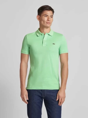 Koszulka polo o kroju slim fit z naszywką z logo model ‘PIQUE’ Lacoste