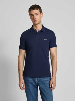 Koszulka polo o kroju slim fit z naszywką z logo model ‘PIQUE’ Lacoste