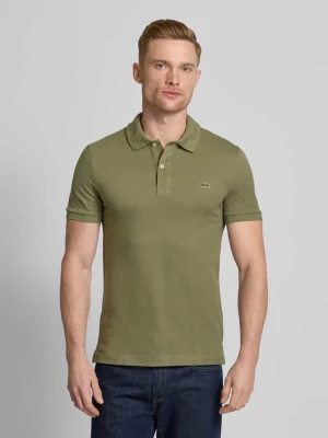 Koszulka polo o kroju slim fit z naszywką z logo model ‘PIQUE’ Lacoste