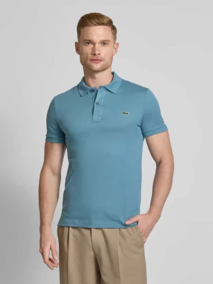 Koszulka polo o kroju slim fit z naszywką z logo model ‘PIQUE’ Lacoste