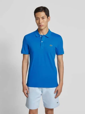 Koszulka polo o kroju slim fit z naszywką z logo model ‘PIQUE’ Lacoste