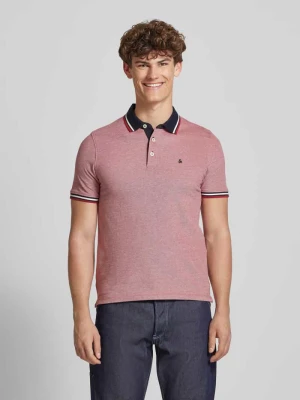 Koszulka polo o kroju slim fit z wyhaftowanym logo model ‘PAULOS’ jack & jones