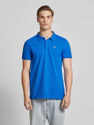 Koszulka polo o kroju slim fit z wyhaftowanym logo Tommy Jeans