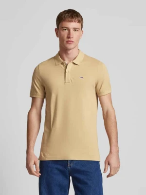 Koszulka polo o kroju slim fit z wyhaftowanym logo Tommy Jeans