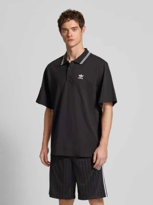 Zdjęcie produktu Koszulka polo o luźnym kroju z wyhaftowanym logo adidas Originals Czarny