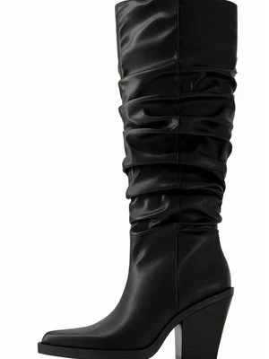 Kowbojki i obuwie motocyklowe Bershka