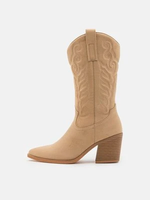 Kowbojki i obuwie motocyklowe Bianco