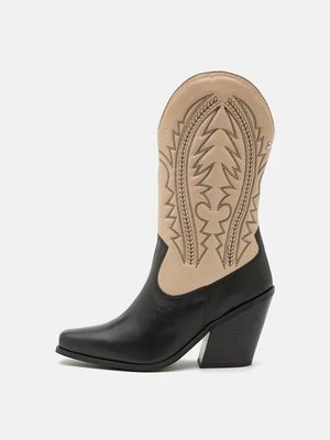 Kowbojki i obuwie motocyklowe Gioseppo