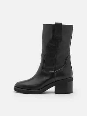 Kowbojki i obuwie motocyklowe Nubikk