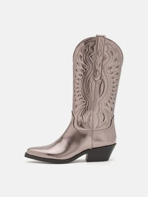 Kowbojki i obuwie motocyklowe Steve Madden