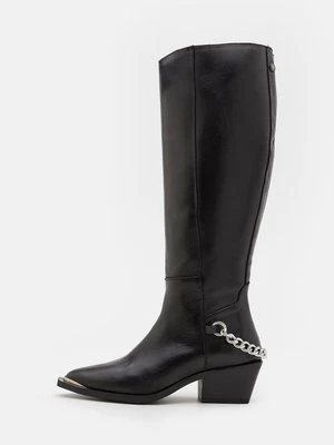 Kowbojki i obuwie motocyklowe Steve Madden