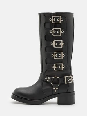 Kowbojki i obuwie motocyklowe Steve Madden