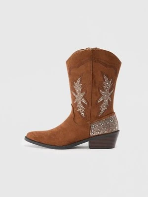 Kowbojki i obuwie motocyklowe Steve Madden