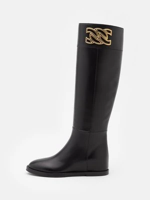 Kozaki na koturnie Casadei