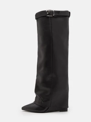 Kozaki na koturnie Steve Madden