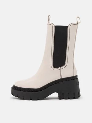 Kozaki na platformie Coach