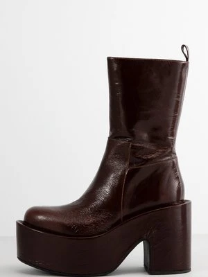 Kozaki na platformie Paloma Barceló