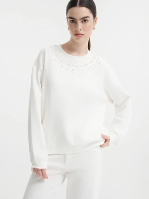 Kremowa bluza z dekoracyjnymi perełkami Greenpoint