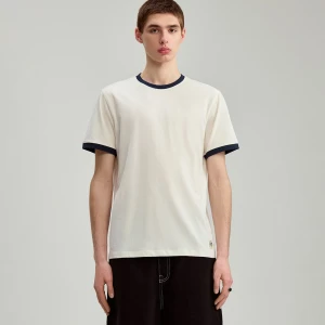 Kremowa koszulka regular fit z kontrastową lamówką House