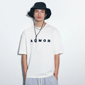 Kremowa koszulka z aplikacją ADMOR House