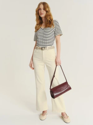 Kremowe jeansy z rozszerzaną nogawką Greenpoint