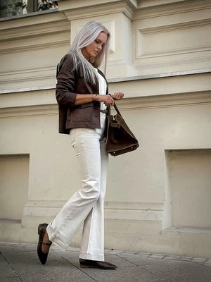 Kremowe spodnie damskie Mona Bootcut z ozdobnymi szwami – Designer Choice Olsen