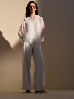 Kremowe spodnie garniturowe z wysokim stanem TARANKO