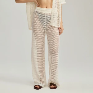 Kremowe spodnie straight fit z transparentnej dzianiny House