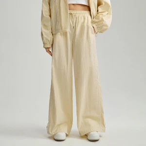 Kremowe spodnie wide leg z białymi wstawkami House