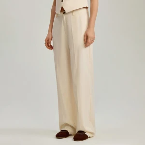 Kremowe spodnie wide leg z wysokim stanem House