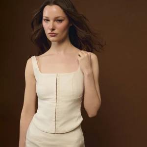 Kremowy gorsetowy top na ramiączkach House