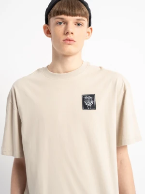 Kremowy t-shirt z autorską grafiką z tyłu Reporter Young