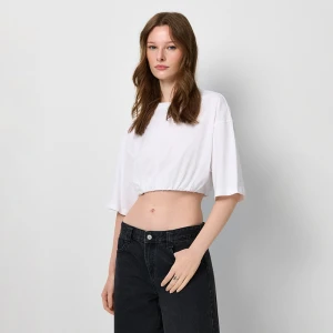 Krótka biała koszulka z gumką na dole House