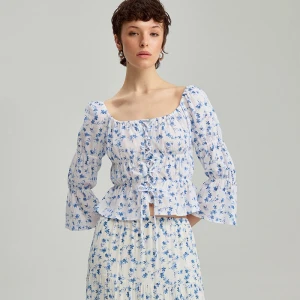 Krótka bluzka z bufkami i wiązaniem w kwiaty House