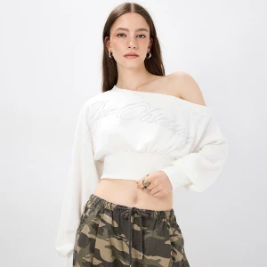Krótki biały sweter z napisem Pure Obsession House