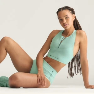 Krótki top do biegania z kwiatowym koronkowym wzorem adidas by Stella McCartney Semi Flash Aqua