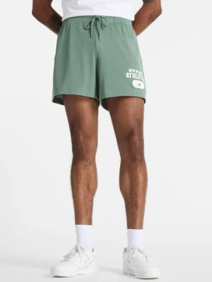 Krótkie spodenki sportowe New Balance nakrapiana petrol