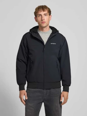 Kurtka funkcyjna z wyhaftowanym logo i kapturem Carhartt WIP Czarny