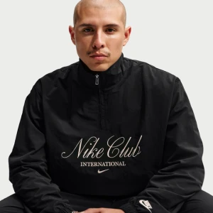 Męska kurtka z zamkiem 1 / 2 Nike Club - Czerń
