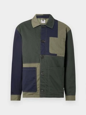 Kurtka przejściowa Element