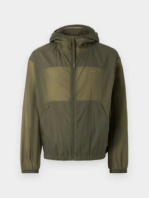 Kurtka przejściowa Lacoste