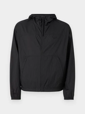 Kurtka przejściowa Lacoste