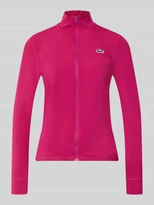Kurtka treningowa o kroju slim fit z naszywką z logo Lacoste Mocnoróżowy
