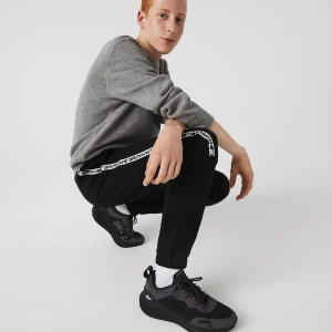 Lacoste męskie spodnie sportowe z lampasami z nadrukiem