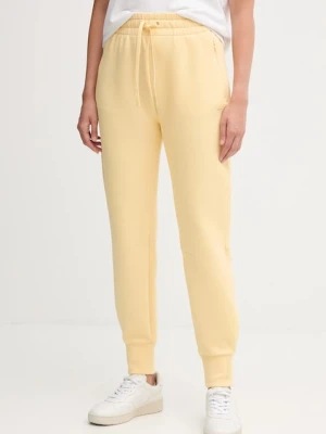 Lacoste spodnie dresowe kolor żółty gładkie XF0343